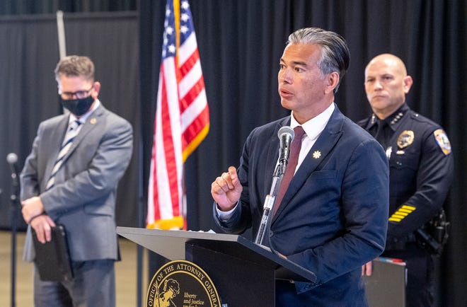 California Attorney General Rob Bonta and other authorities announce on Jan. 13 the arrest of dozens of members of the Sureño criminal street gang for their involvement in the 2020 murders of three teenagers at Golden West High School in Visalia.