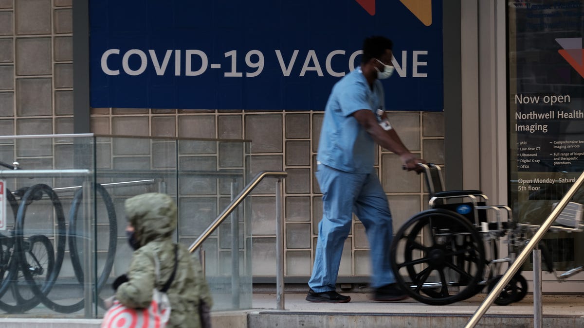 A sign outside of a hospital advertises the COVID-19 vaccine on November 19, 2021 in New York City.
