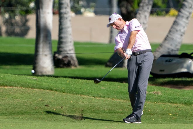 January 13, 2022; Honolulu, Hawaii, USA; Jim Furyk hits his second shot on the 18th hole during the first round of the Sony Open in Hawaii golf tournament at Waialae Country Club. Mandatory Credit: Kyle Terada-USA TODAY Sports
