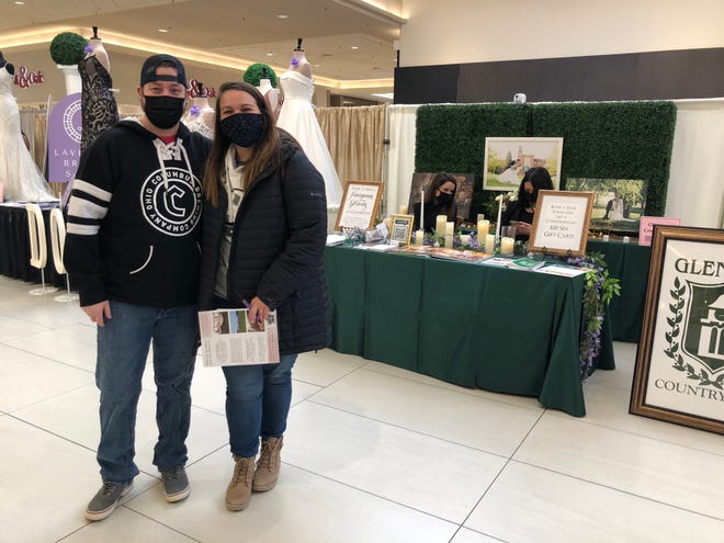 Molly Miller and Josiah Beha of Perry Township, who are planning to get married in June, booked a venue in Portage Lakes two months ago. They attended the Belden Village Bridal Show on Saturday at the mall in Jackson Township. The show continues Sunday.