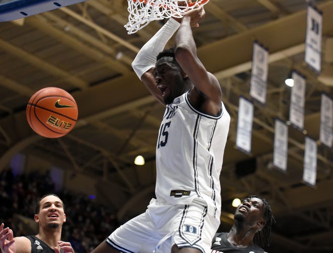 Jan 15, 2022; Durham, North Carolina, USA;  Duke Blue Devils center Mark Williams(15) reacts while dunking during the second  half  against the North Carolina State Wolfpack at Cameron Indoor Stadium. Mandatory Credit: Rob Kinnan-USA TODAY Sports