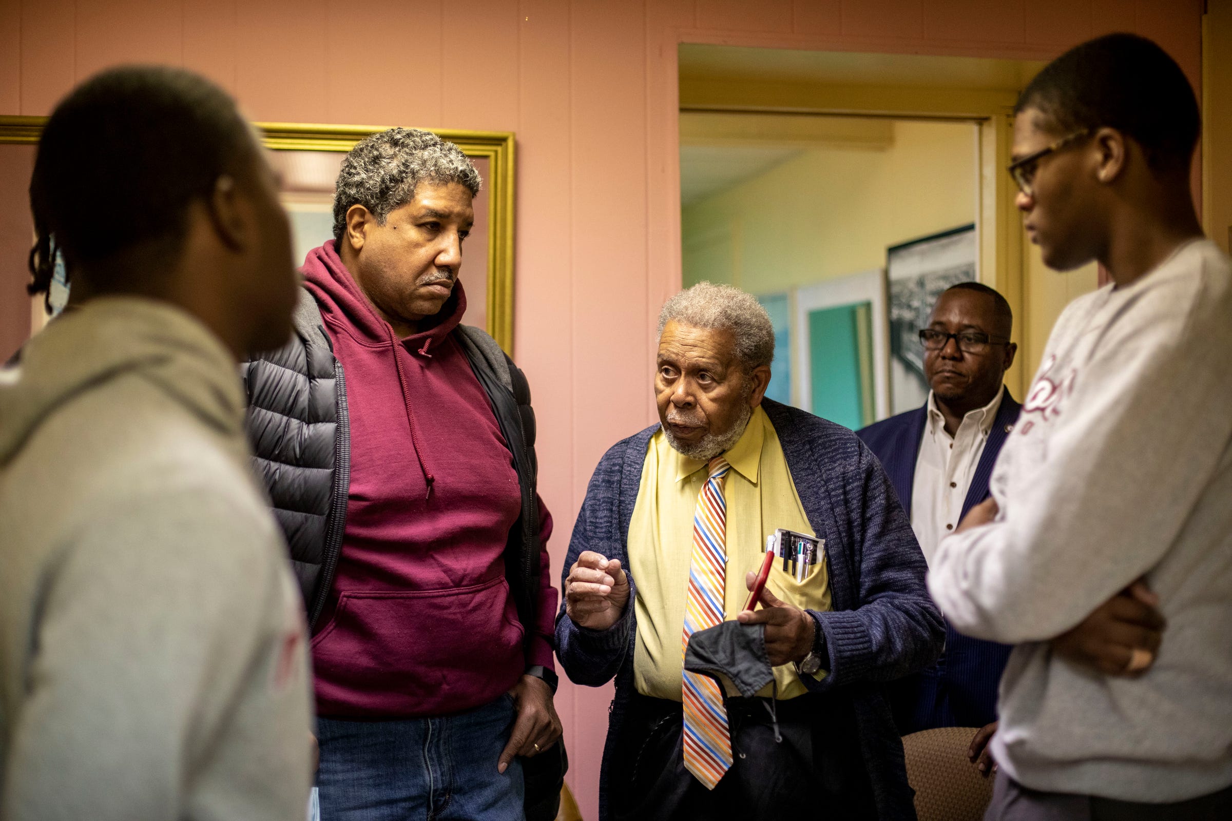 Dr. William Jackson, center, talks with some of his friends who are also Morehouse alums at his office in Detroit, MI on Friday, January 14, 2022. Jackson is a graduate of Morehouse College, the same college Dr. Martin Luther King Jr. attended. Jackson interacted with King and is still currently practicing medicine at age 89.