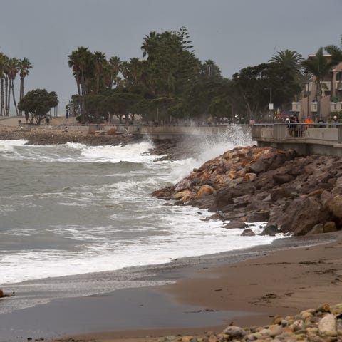 Waves crash along the shore in Ventura on Saturday
