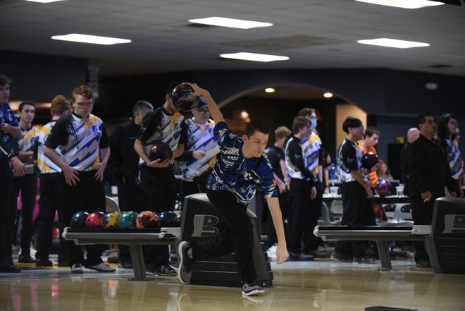 Adrian's Kyle Neuman bowls during warm-ups for the Madison Baker Bash on Saturday, Jan. 15 at Lenawee Recreation Bowling Center.
