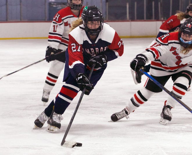 Pembroke's Mary Quatrale carries the puck during a game against Hingham at Pilgrim Skating Arena in Hingham on Saturday, Jan. 15, 2022.