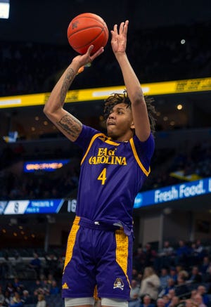 This file photo from 2020 shows ECU forward Brandon Suggs, who scored 17 points and made the game-winning shot as time expired in the Pirates' 72-71 win over Memphis on Saturday.