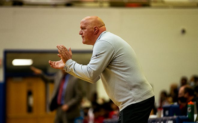 Male head basketball coach Tim Haworth encouraged his team during the boys LIT final Saturday night at Valley High School. The Male Bulldogs defeated the Butler Bears 96-84 to win the 2022 Boys LIT Championship. January 15, 2022