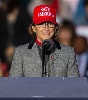 Arizona state Sen. Wendy Rogers gives a speech ahead of former President Donald Trump's speech in Florence on Jan. 15, 2022.