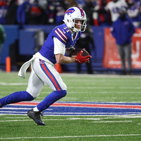 Bills receiver Cole Beasley  gains yardage after a