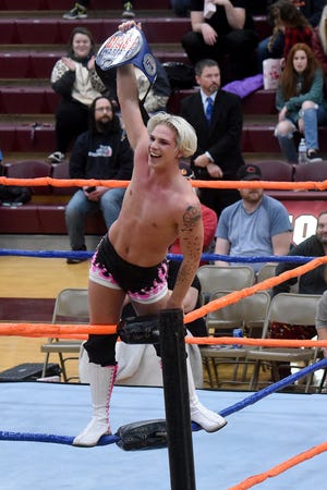Austin Blayze, real name Austin Philabaum from Coshocton, celebrated a big win at a Buckeye Wrestling Alliance show in Newark earlier this year. Blayze will appear at Blurred Lines Sept. 24 at River View Junior High School.