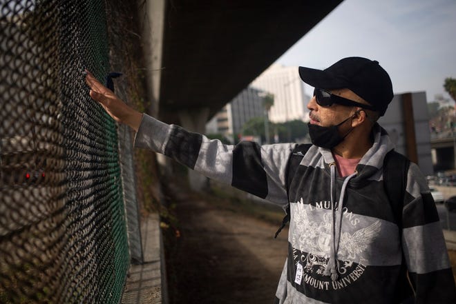 Fernando Maya under the overpass where he lived in a tent off of the 101 Freeway in Los Angeles on Nov. 17, 2021.