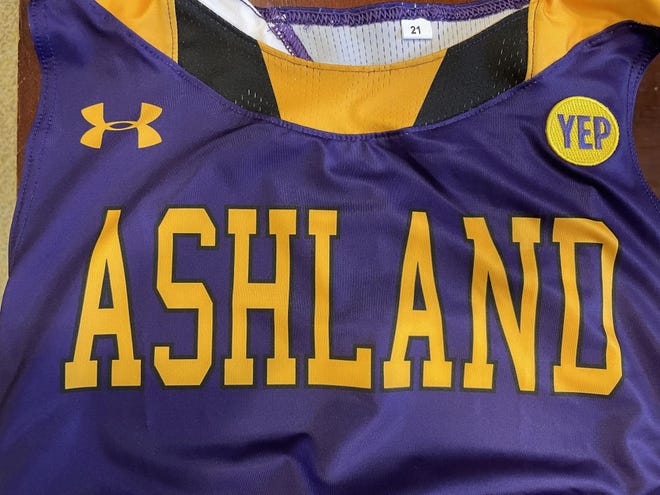 Ashland University's men's and women's track and field teams are sporting two new uniform patches — "JUD" and "YEP" — in honor of former head coach Jud Logan, who passed away earlier in January.