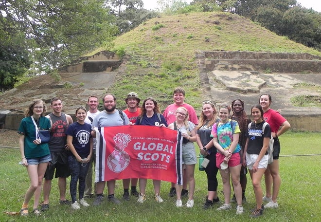 The Monmouth group is pictured at the Casa Blanca archaeological site in Chalchuapa.