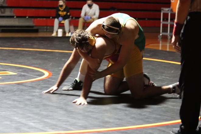 Levi Neumann, Geneseo’s heavyweight wrestler secured the team win with a pin against Rock Island in the final matchup of the night at Rock Island.