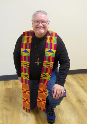 The Rev. Stuart Schoup, interim pastor at First Congregational United Church of Christ in Geneseo, wears a stole that he received while serving in Ghana.