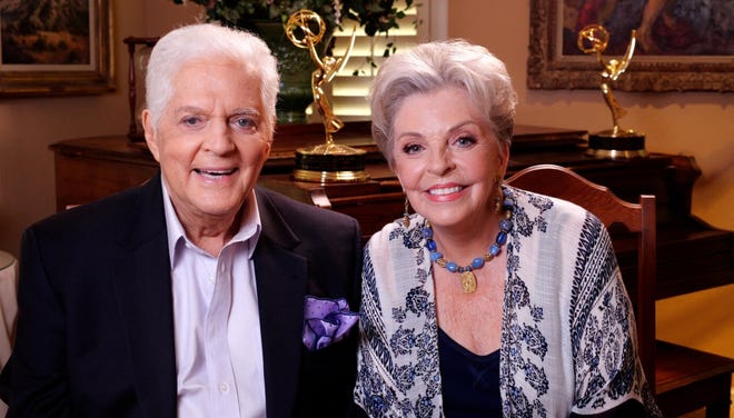 Bill and Susan Seaforth Hayes in their living room filming "Secrets of Soap Opera Lovers."