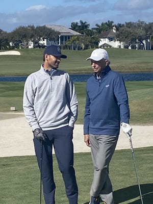 Vero Beach native Mardy Fish, left, and Steven Owen, father of country star Jake Own, play a round of golf this past weekend at the Windsor Club in Vero Beach.