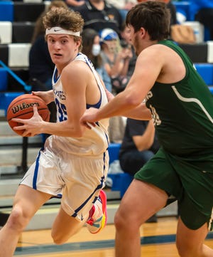 Ellwood City's Joseph Roth drives to the basket against Laurel on Jan. 19 at Lincoln High School.