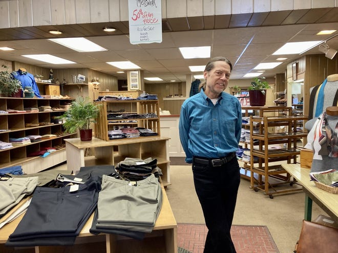 Jeff Pagel, owner of The Clothes Post, poses in the store on Wednesday, Jan. 12, at 326 E. Mitchell St. in Petoskey. Pagel will be closing the store in February in order to enjoy his retirement.
