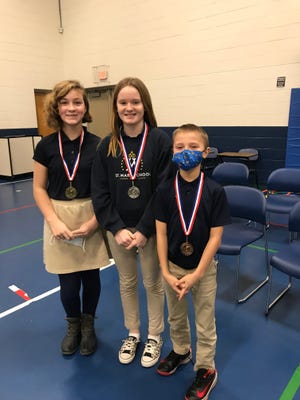 St. Mary's spelling bee 6th grade winners (from left to right) are Jillian Gray, Norah Scheller and Braylon Martenson.