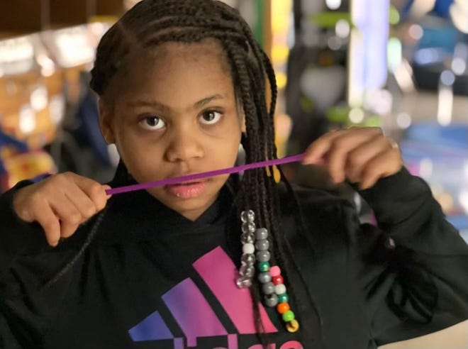 Tiana Huddleston, 8, died after being struck by gunfire. Her father has been charged in connection with the shooting death.