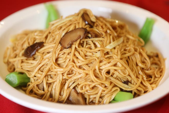 Braised soft noodles with mushrooms.