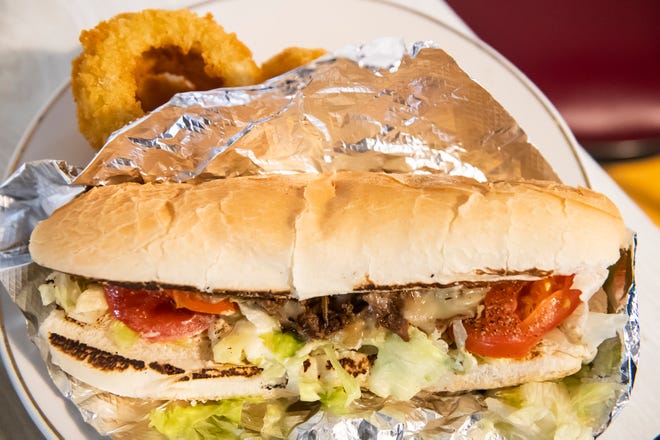 Cheesesteak connoisseurs will find plenty of melted provolone cheese - not whiz - on Steve Jackson's "Baltimore-style" cheesesteak sub at Datts Seafood.