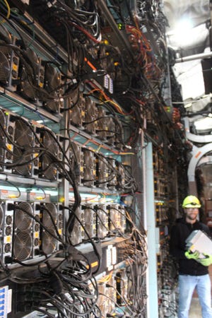 Numerous banks of computer processors have been installed within the original Greenidge power plant as the Bitcoin mining operation has expanded.