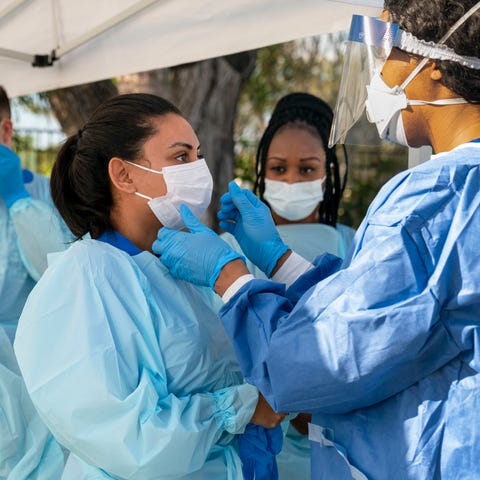 A medical team prepares to test people for the cor