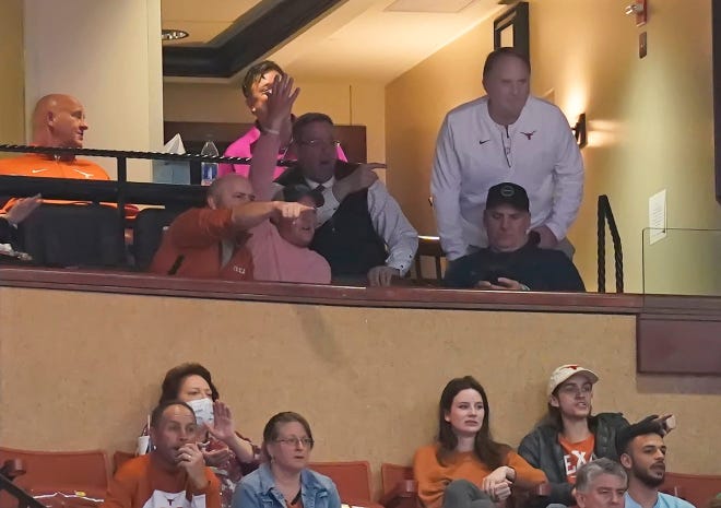 Former TCU football coach Gary Patterson, top right, wore a white UT top while sitting in Texas athletic director Chris Del Conte's suite at the Erwin Center during Tuesday's loss to Kansas State. Patterson is expected to be named a special assistant to Steve Sarkisian's football staff. Scott Wachter/USA TODAY SPORTS