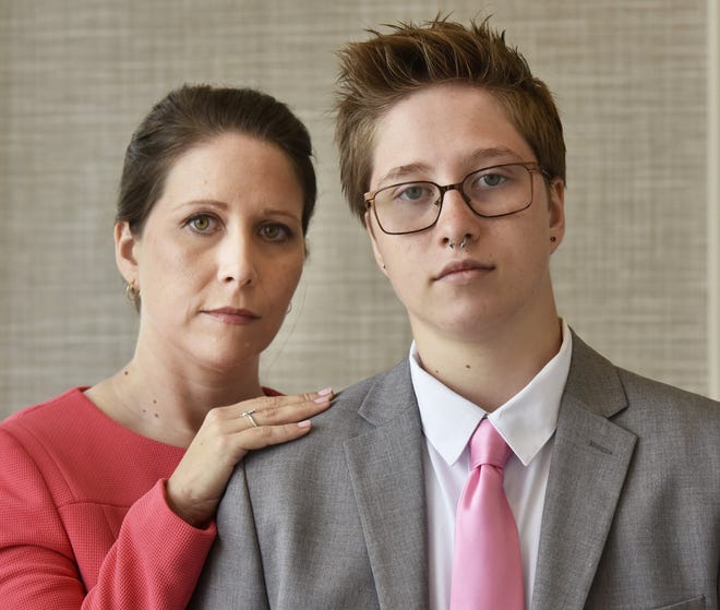 Drew Adams (right), 16 in this 2017 photo with mother Erica Kasper, will be represented by the U.S. Justice Department next month in a federal appeals court in a case where he was denied the use of the boys' bathroom at Nease High School.