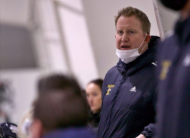 Archbishop Williams coach Doug Nolan watches the action during a game against Weymouth at Canton Sportsplex on Wednesday, Jan. 19, 2022.