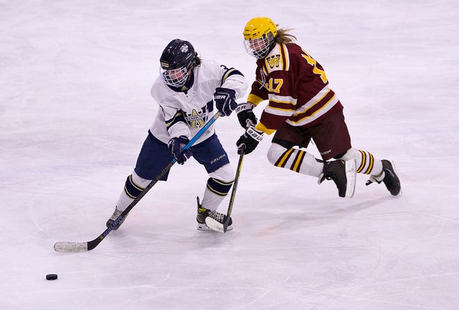 Archbishop Williams' Caroline Batchelder skates up the ice during a game against Weymouth at Canton Sportsplex on Wednesday, January 19, 2022.