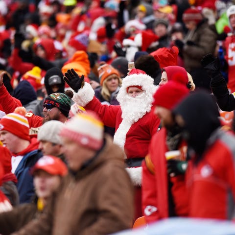 Chiefs fans do the so-called tomahawk chop during 