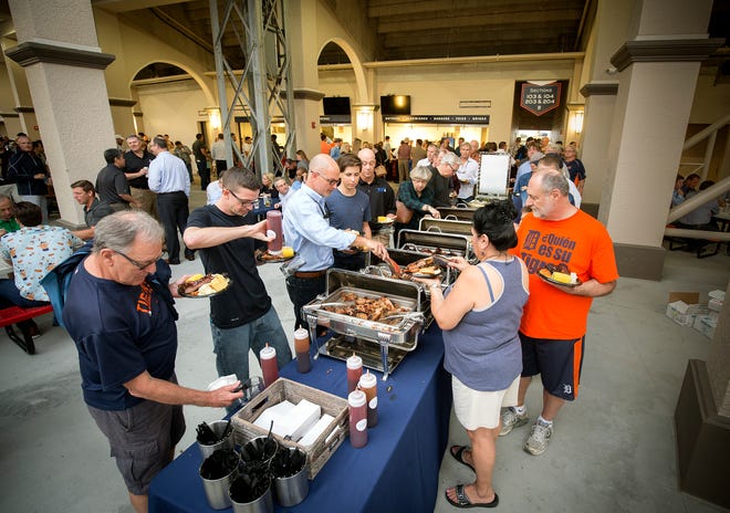 Detroit Tigers fans line up for barbeque during the 71st year of the Lakeland Area Chamber of Commerce's Annual Tiger BBQ at Joker Marchant Stadium, February 21, 2017.
