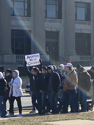 Students participate in Friday's anti-abortion march in downtown Springfield.
