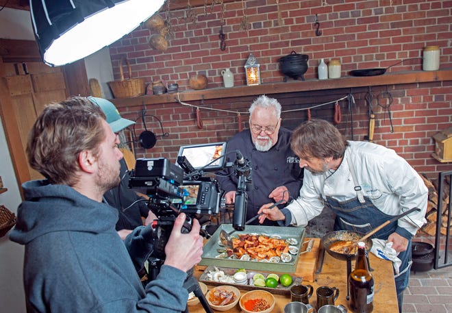Pensacola chef Irv Miller demonstrates his take on historical cooking for Chef Walter Staib while filming an episode of A Taste of History on Friday, Jan.21, 2022. The Emmy award-winning show will feature the talents of three of Pensacola's top chefs, Irv Miller, Gus Silivos, and Blake Rushing, in the 12th Season on PBS. 