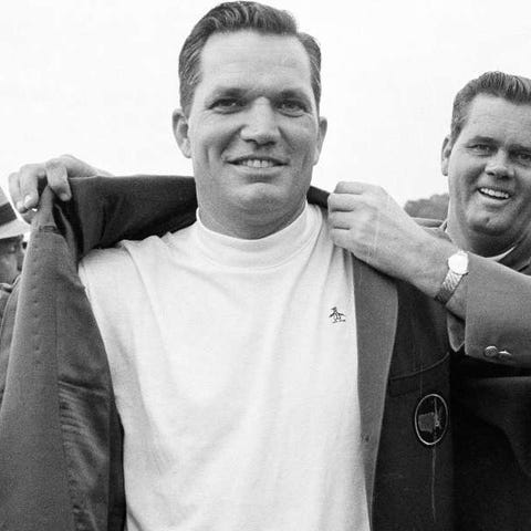 Bob Goalby receiving the green jacket in 1968 from
