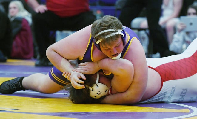 Nevada's Camdan Vincent won his first Heart of Iowa Conference championship after pinning Roland-Story's Colin Hansen during the finals at 285 pounds Friday at the Nevada High School Field House in Nevada.