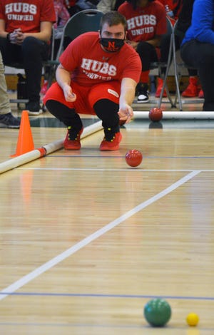 North Hagerstown's Austin Ellis carefully releases his shot during the early stages of the Washington County Unified Sports Bocce Championship on Jan. 22 at South Hagerstown High School.