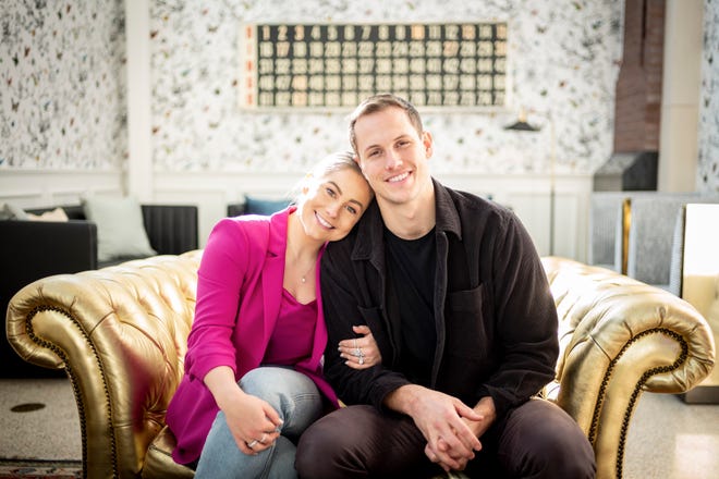 Olympian Shawn Johnson East and her husband, former NFL player Andrew East, at Poindexter coffee in Nashville, Tenn., Friday, Jan. 21, 2022. The couple host a podcast called "Couple Things."