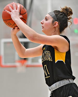 Red Lion's Grace Masser lines up her shot during girls' basketball action at Central York High School in Springettsbury Township, Friday, Jan. 21, 2022.  Central York would win the game 44-41. Dawn J. Sagert photo