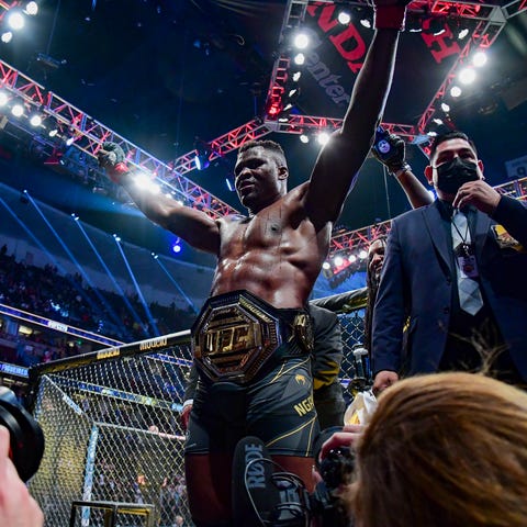 Francis Ngannou leaves the octagon after defeating