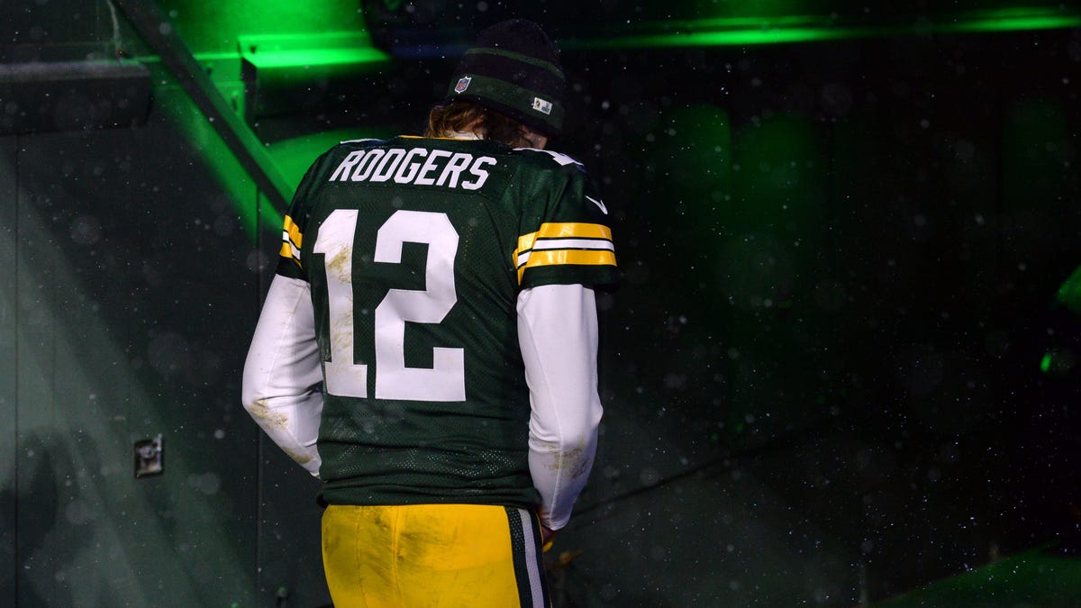 Green Bay Packers quarterback Aaron Rodgers (12) exits the field after losing to the San Francisco 49ers during a NFC Divisional playoff football game at Lambeau Field.