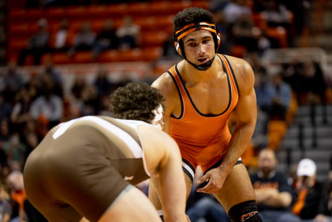A warrant has been issued for the arrest of former Oklahoma State wrestler A.J. Ferrari on a charge of sexual battery.