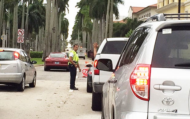 Palm Beach Police operate a post-hurricane checkpoint at the east end of the Royal Park Bridge in October 2016.