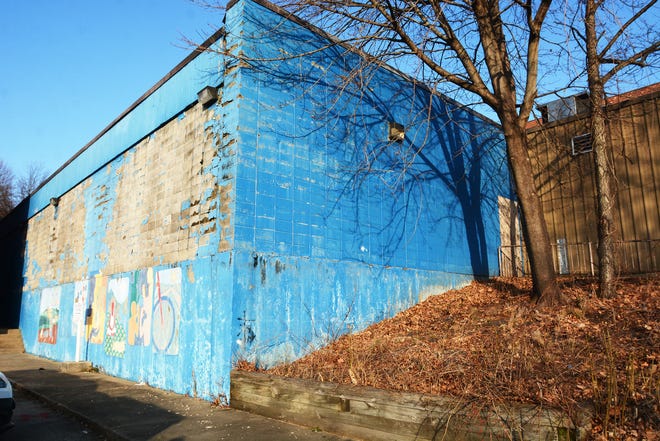 A rear and side wall at the former YMCA in the center of Norwich.