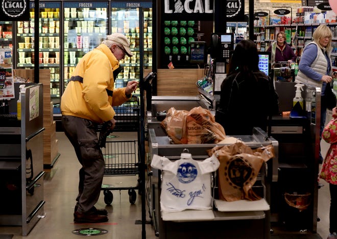Fred Higgs of Canton at Busch's in Canton on Saturday, Jan. 22, 2022. Higgs has noticed the rise in prices on everything from produce to meats and milk at grocery stores.