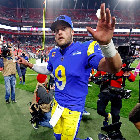 Rams quarterback Matthew Stafford walks off the fi