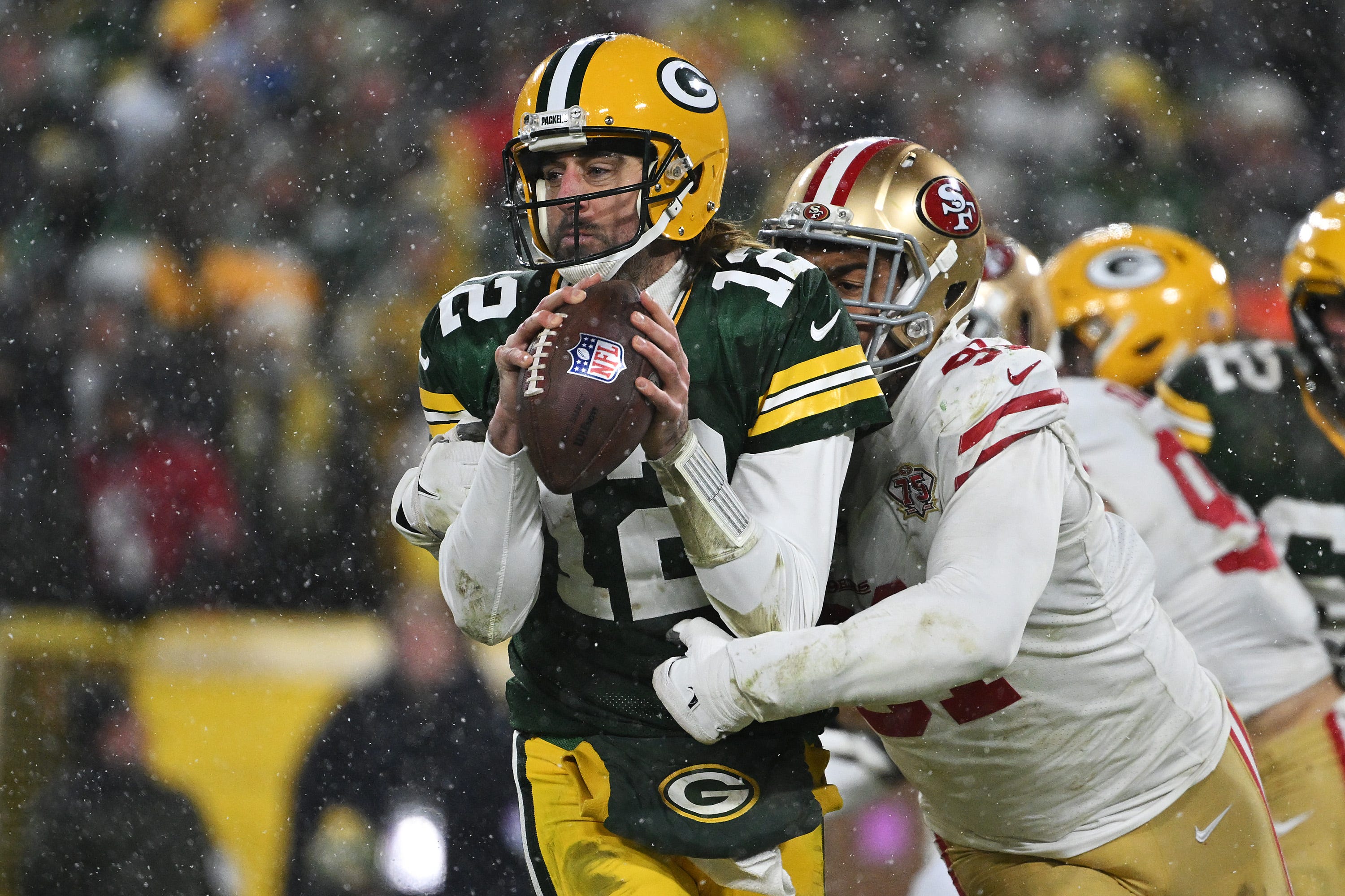 San Francisco 49ers defensive end Arik Armstead (91) sacks Green Bay Packers quarterback Aaron Rodgers (12) late in the fourth quarter during their NFL divisional round football playoff game Saturday January 22, 2022, at Lambeau Field in Green Bay, Wis. Dan Powers/USA TODAY NETWORK-Wisconsin 